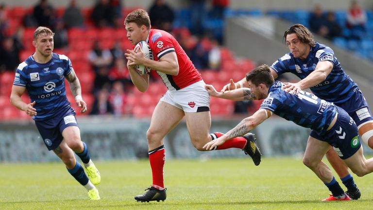 Jack Wells races away to score for Salford