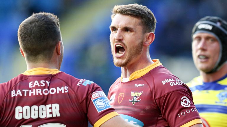 Lee Gaskell and Jack Cogger celebrate Huddersfield’s attempt to win over Warrington