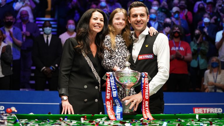 Selby celebrated his latest world title win with his wife and daughter