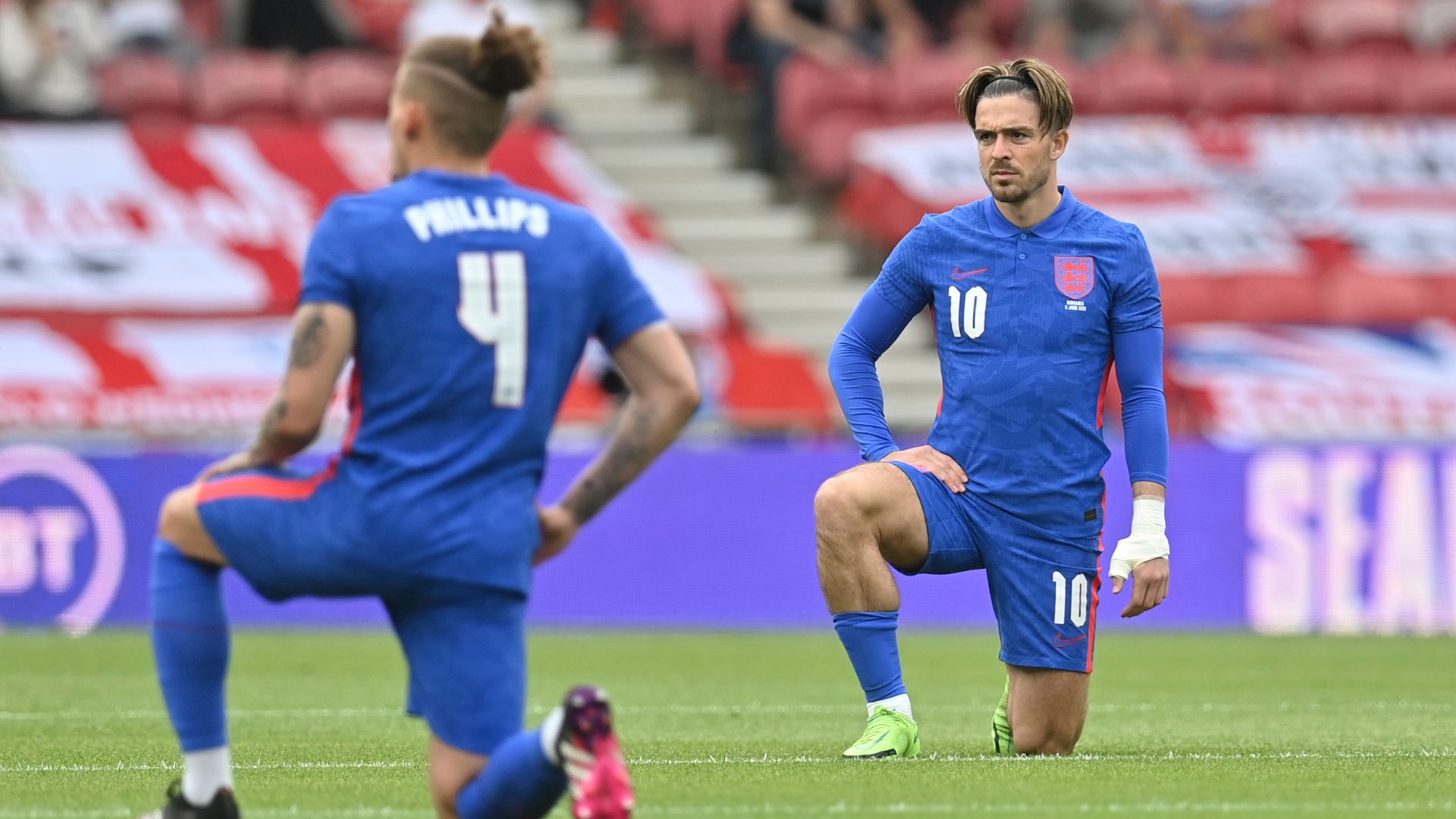 Fan boos persist despite England plea over taking a knee
