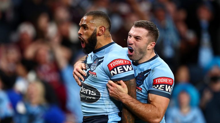 Josh Addo-Carr of the Blues celebrates after scoring a try with James Tedesco