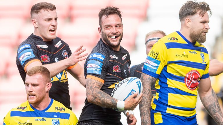 Gareth O'Brien celebrates scoring a try against Warrington