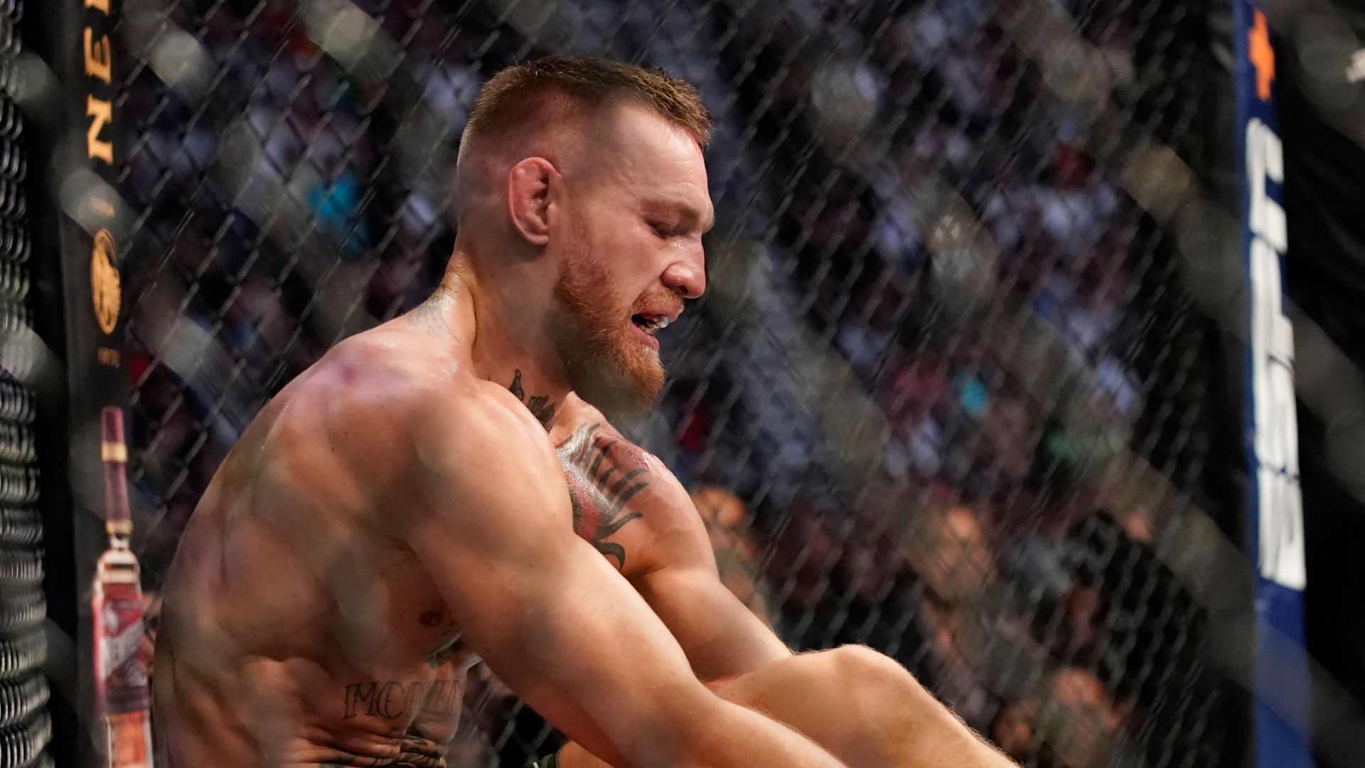 McGregor sustains leg break in Poirier defeat