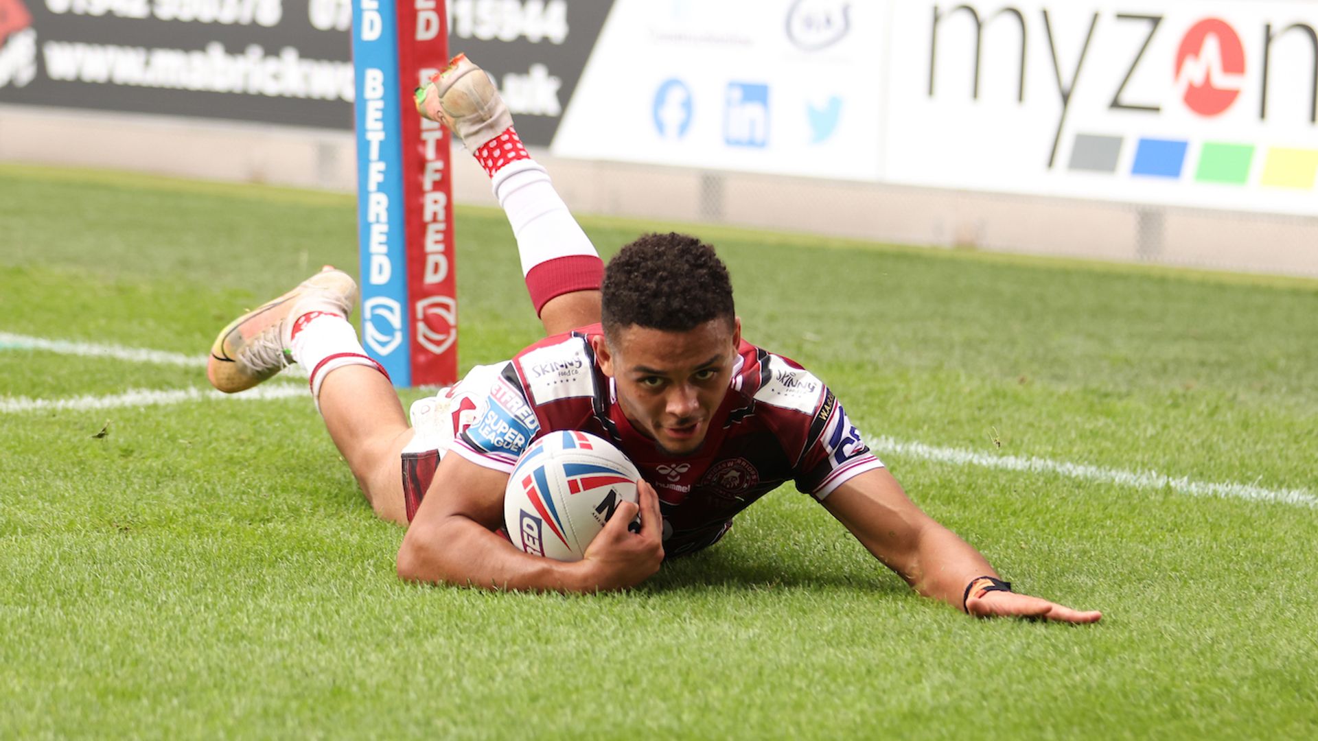Wigan crush Leigh after double red card