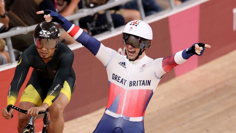 Team GB's Jason Kenny became the first Team GB athlete to win seven gold medals - and nine medals overall - while retaining his keirin title in track cycling.