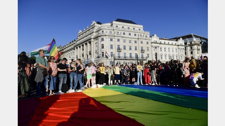 Protestors in Budapest unfurled a rainbow flag in front of the Hungarian Parliament building when the so-called 'Child Protection Act' was passed into law in June