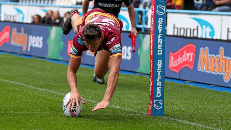 Louis Senior scores a try for Huddersfield