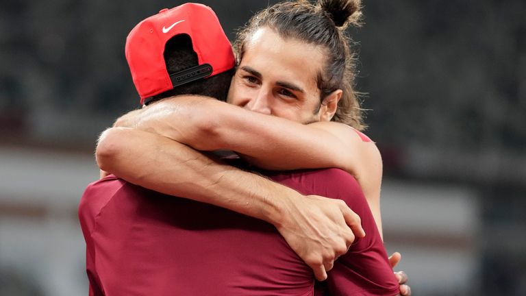 Friends and rivals - Gianmarco Tamberi and Mutaz Essa Barshim share the spoils after a stunning high jump final