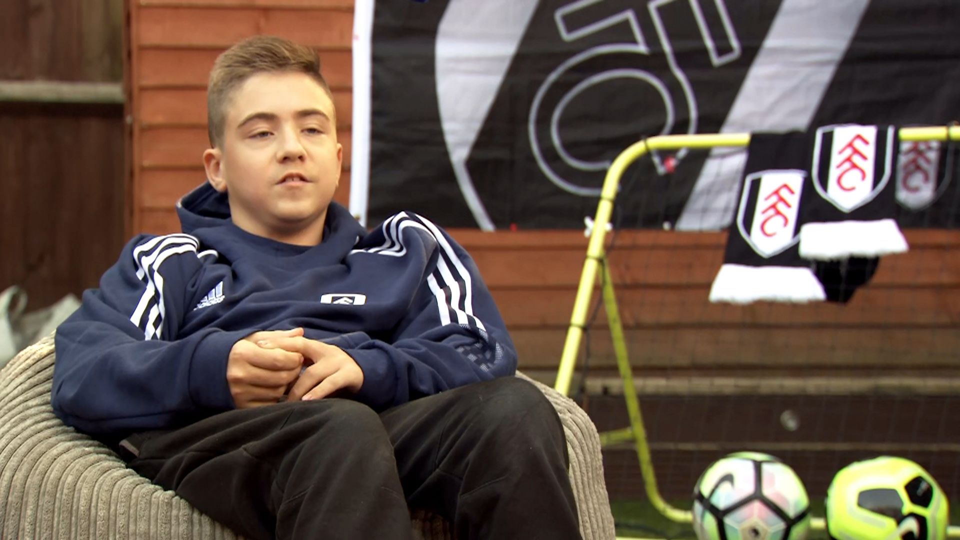 Fulham fan Rhys responds to TikTok trolls with charity mission