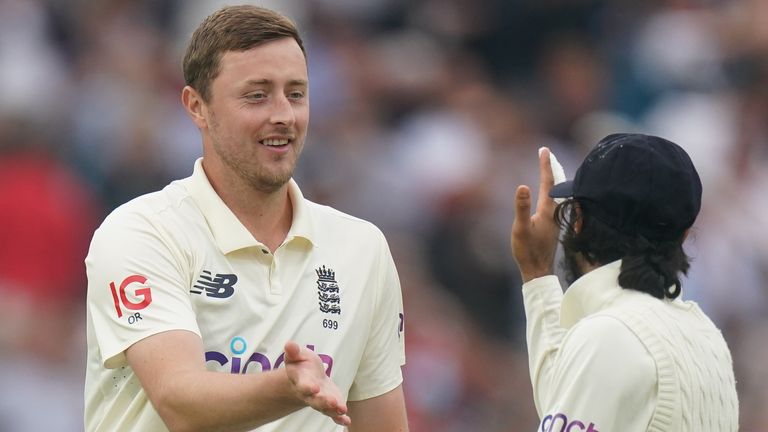 England's Ollie Robinson (L) celebrates a wicket with Haseeb Hameed (PA Images)