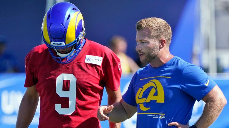 Rams head coach Sean McVay talks to quarterback Matthew Stafford during training camp