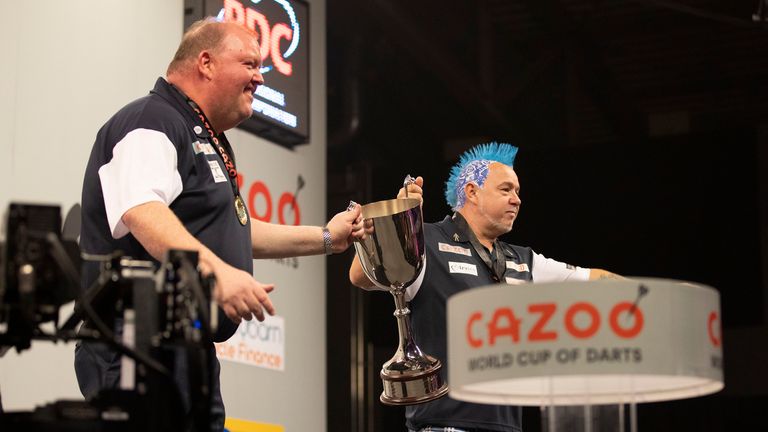 John Henderson and Peter Wright celebrate their World Cup of Darts triumph