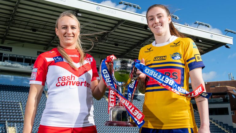 St Helens' Jodie Cunningham and Leeds' Sophie Nuttall pose with the Women's Super League trophy ahead of Sunday's Grand Final