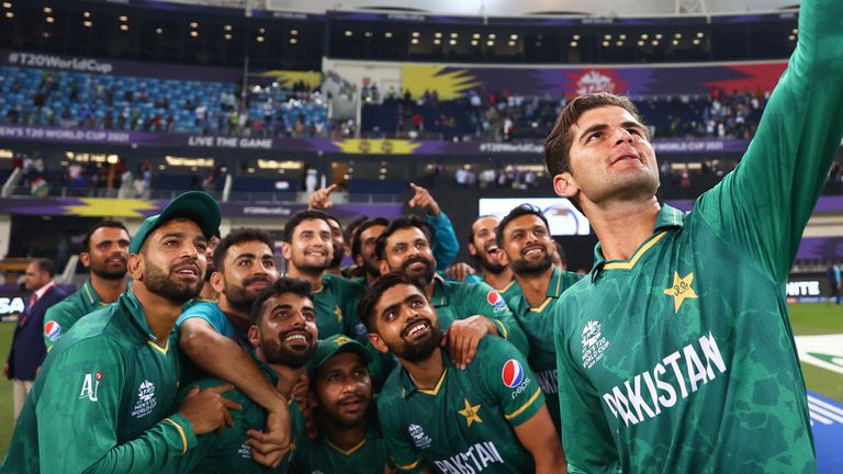 Pakistan celebrate their 10-wicket win over India, their first victory over their rivals in World Cup cricket