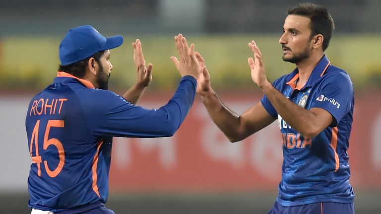 India debutant Harshal Patel celebrates the wicket of Glenn Phillips of New Zealand 