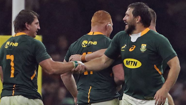 Kwagga Smith and Frans Steyn celebrate as the Springboks secured a first Test victory in Cardiff for eight years 