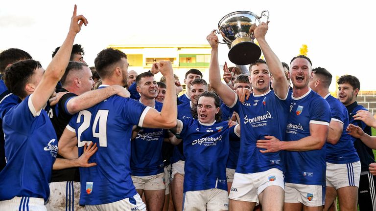 Tullamore players celebrate with the trophy