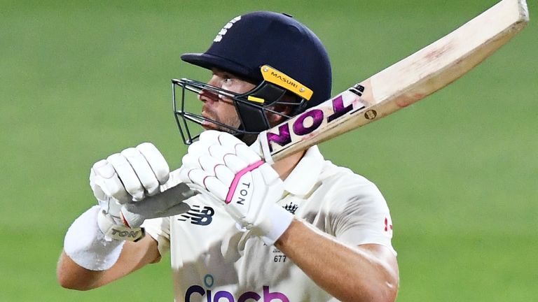 Dawid Malan looks up wide-eyed after a flash of lighting that caused play to be abandoned