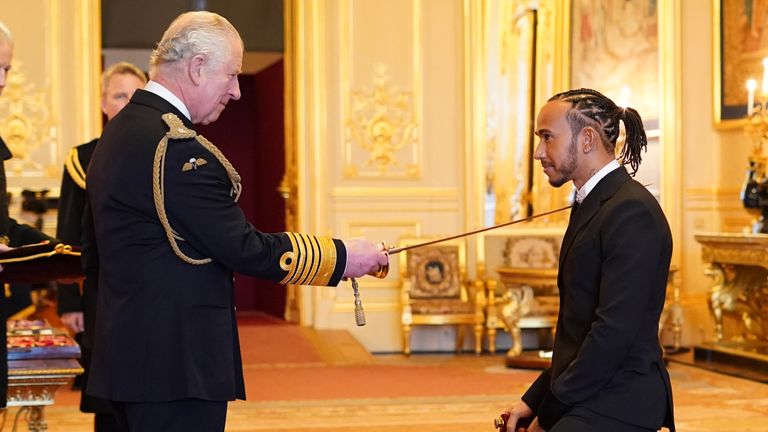 This is the moment Sir Lewis Hamilton was knighted by the Prince of Wales for his services to motorsport.  He joins Sir Jackie Stewart, Sir Stirling Moss and Sir Jack Brabham as the fourth F1 driver to be knighted.