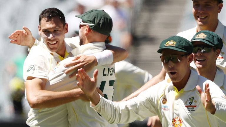 Scott Boland (left) finished 6-7 from four overs as Australia finished an Ashes win