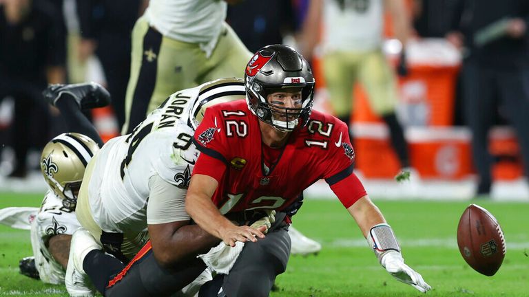 Tom Brady fumbles after a hit by New Orleans Saints defensive end Cameron Jordan in a previous meeting between the two teams