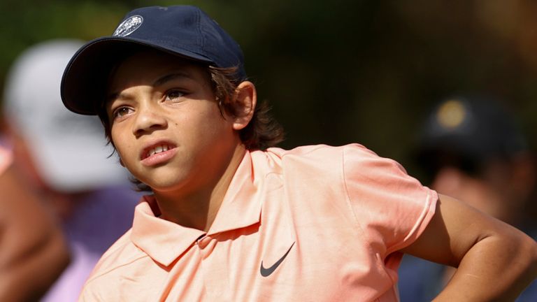 Charlie Woods, 12, impressed alongside his father in the 20-team event