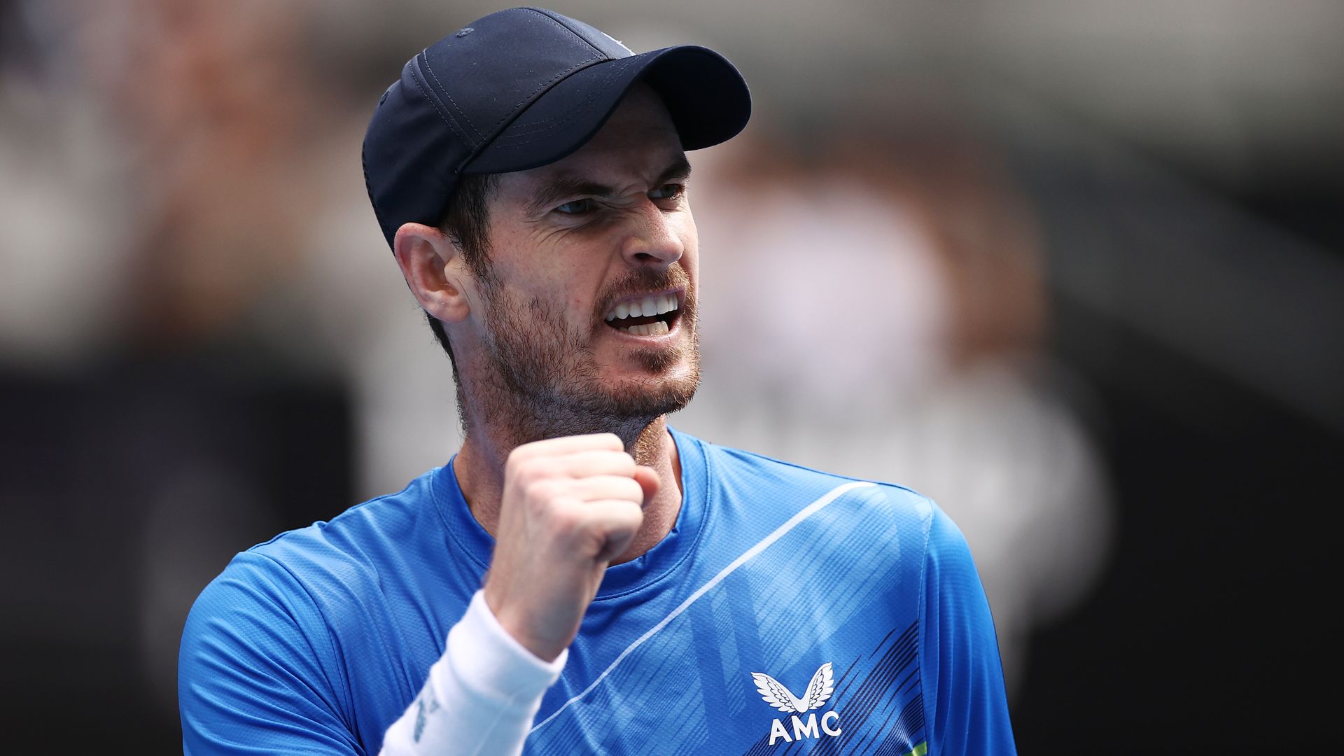 Murray wins in five to make Australian Open second round