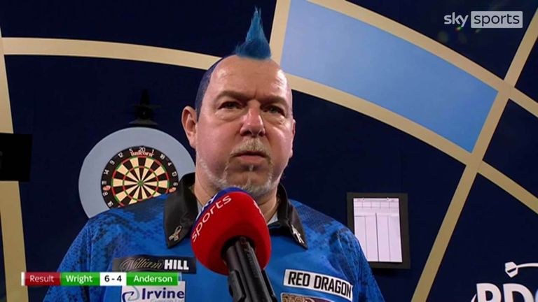 Wright reacts after beating Gary Anderson in a classic