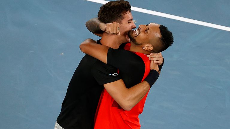 Kyrgios (right) and Kokkinakis celebrate winning the title together in front of a packed crowd on Rod Laver Arena