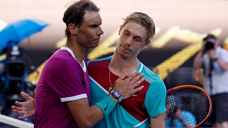 Nadal (left) consoles Shapovalov at the net following their five-set thriller