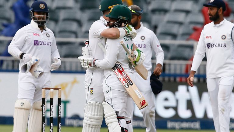 Elgar and Temba Bavuma celebrate after leveling series against tourists