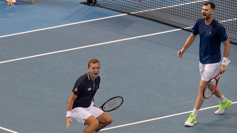 Daniel Evans and Jamie Murray had rallied from a set-and-a-break down to beat USA's Taylor Fritz and John Isner 6-7(3), 7-5, 10-8 to keep Great Britain's hopes alive 