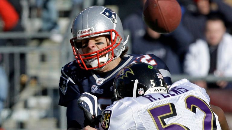 Baltimore Ravens linebacker Ray Lewis hits Brady in the first quarter of their Wild Card win over the New England Patriots in 2010