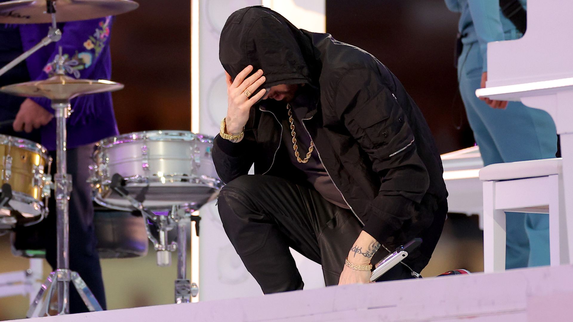 NFL denies attempting to stop Eminem from taking knee