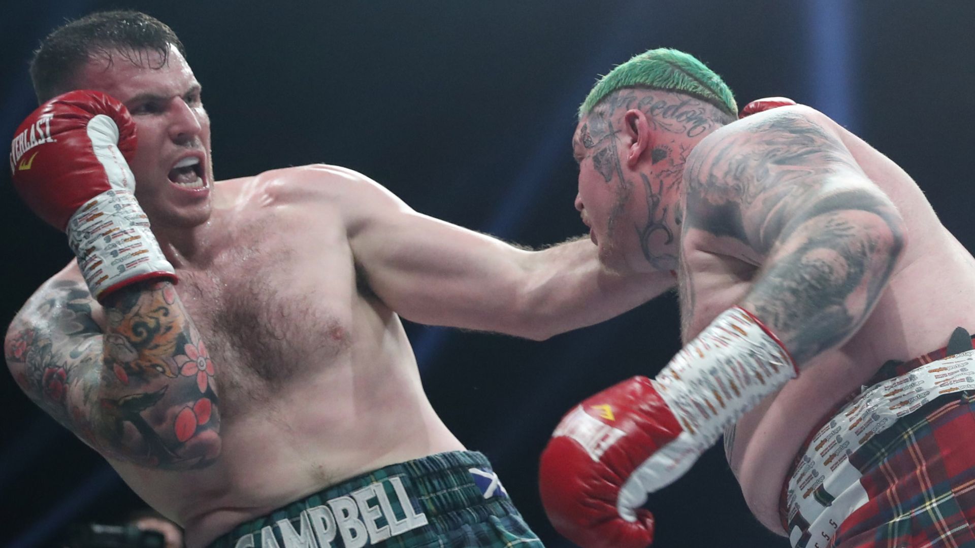 Campbell stops McFarlane in heavyweight brawl