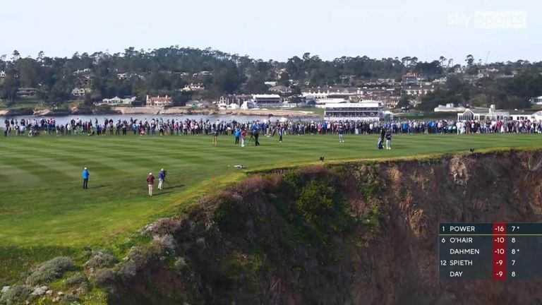 Jordan Spieth plays a tricky shot off the edge of a cliff above an 86ft drop at the Pebble Beach Pro-Am