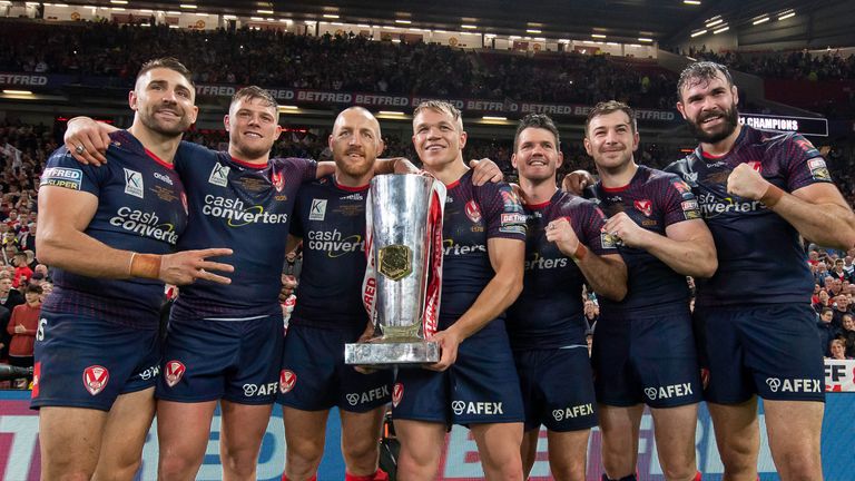 Three-peat: St. Helens captain, James Roby, lifts the 2021 Super League trophy for the third year in a row alongside his team-mates Jonny Lomax, Morgan Knowles, Lachlan Coote, Mark Percival, Tommy Makinson and Alex Walsmley