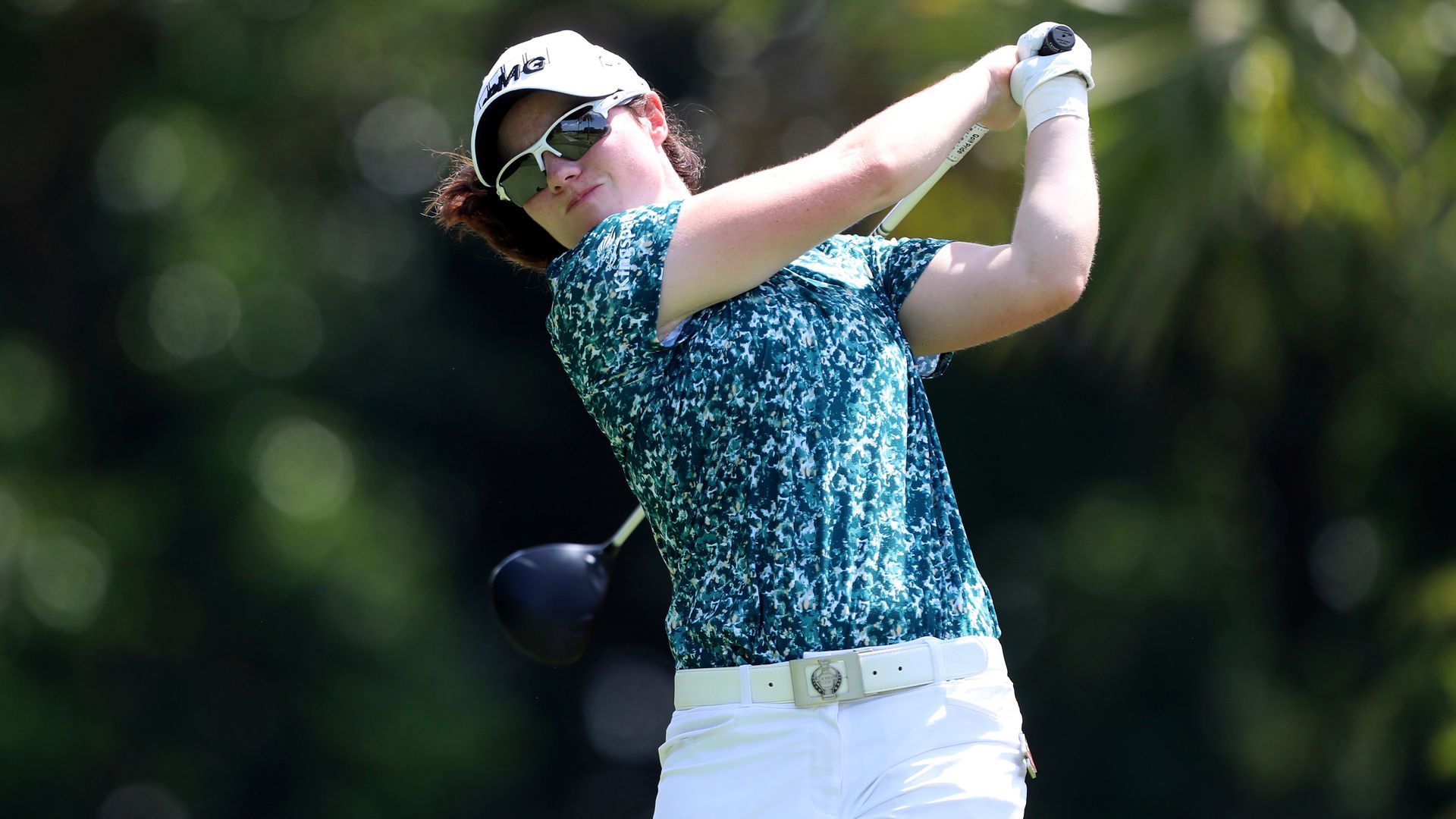 Ireland's Maguire three shots off lead in Singapore