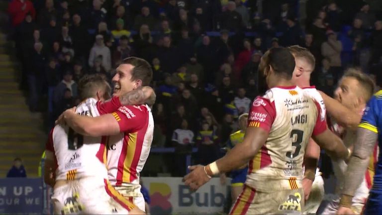 Mitchell Pearce puts the Catalan Dragons further in front against the Warrington Wolves with his first Super League try.