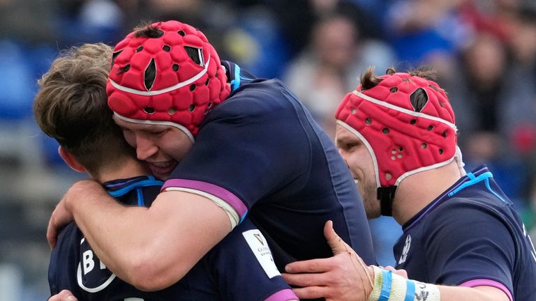 Scotland's celebrate Graham's try - their fourth in the contest