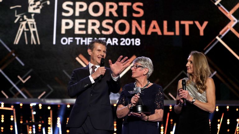 Dorothy Hyman (centre) is presented with BBC Sports Personality of the Year award from 1963 that she didn't receive at the time from Steve Cram and Paula Radcliffe