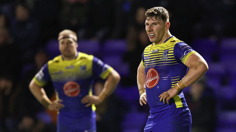 George Williams and Oliver Holmes look dejected during Warrington's defeat to Catalans