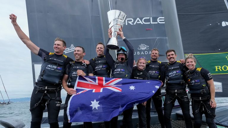 The Australia SailGP team celebrate on board their F50 (Image credit: Thomas Lovelock for SailGP)