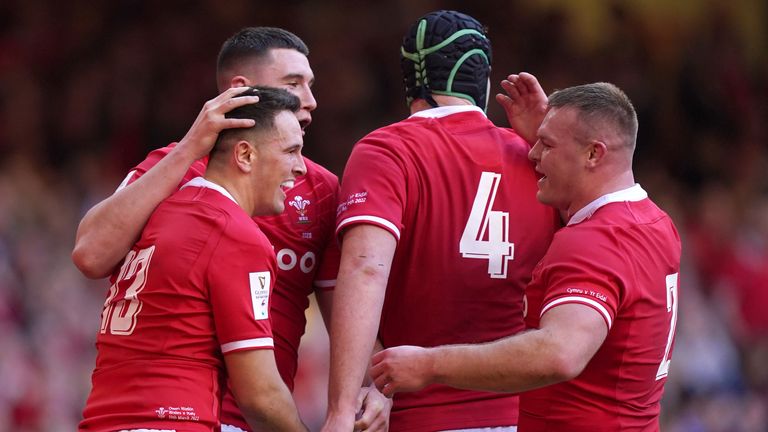 Watkin is congratulated after his first-half try for Wales 