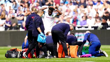 Image of Burnley's Ashley Westwood requires medical attention after being injured