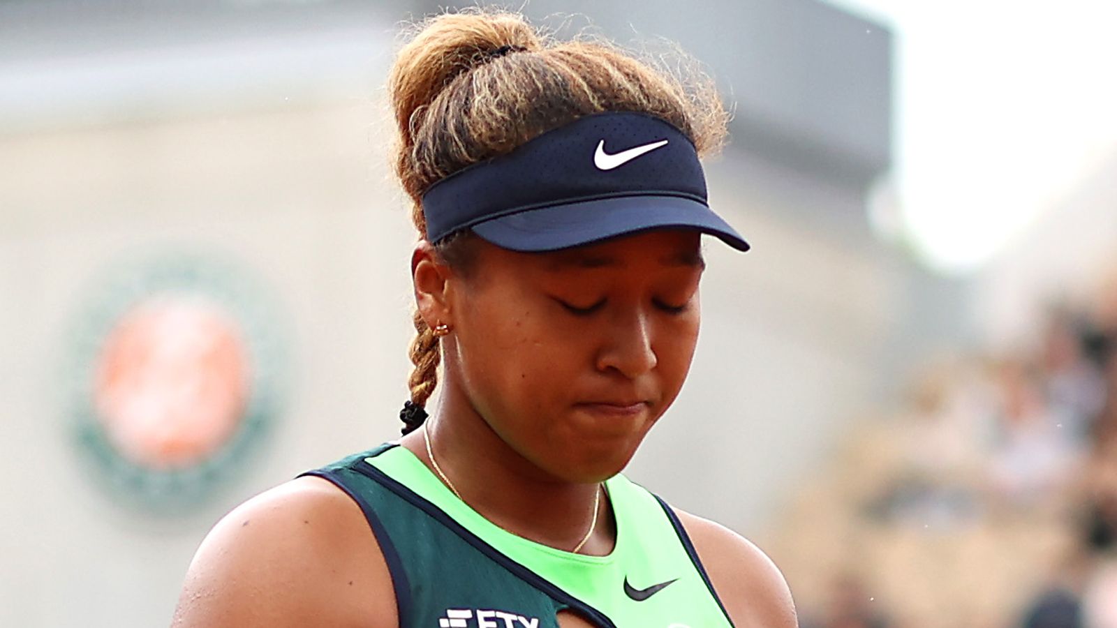Naomi Osaka knocked out of French Open and casts doubt on playing Wimbledon