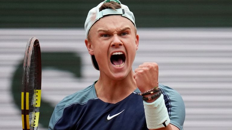 Denmark's Holger Rune upset Stefanos Tsitsipas to reach the French Open quarter-finals