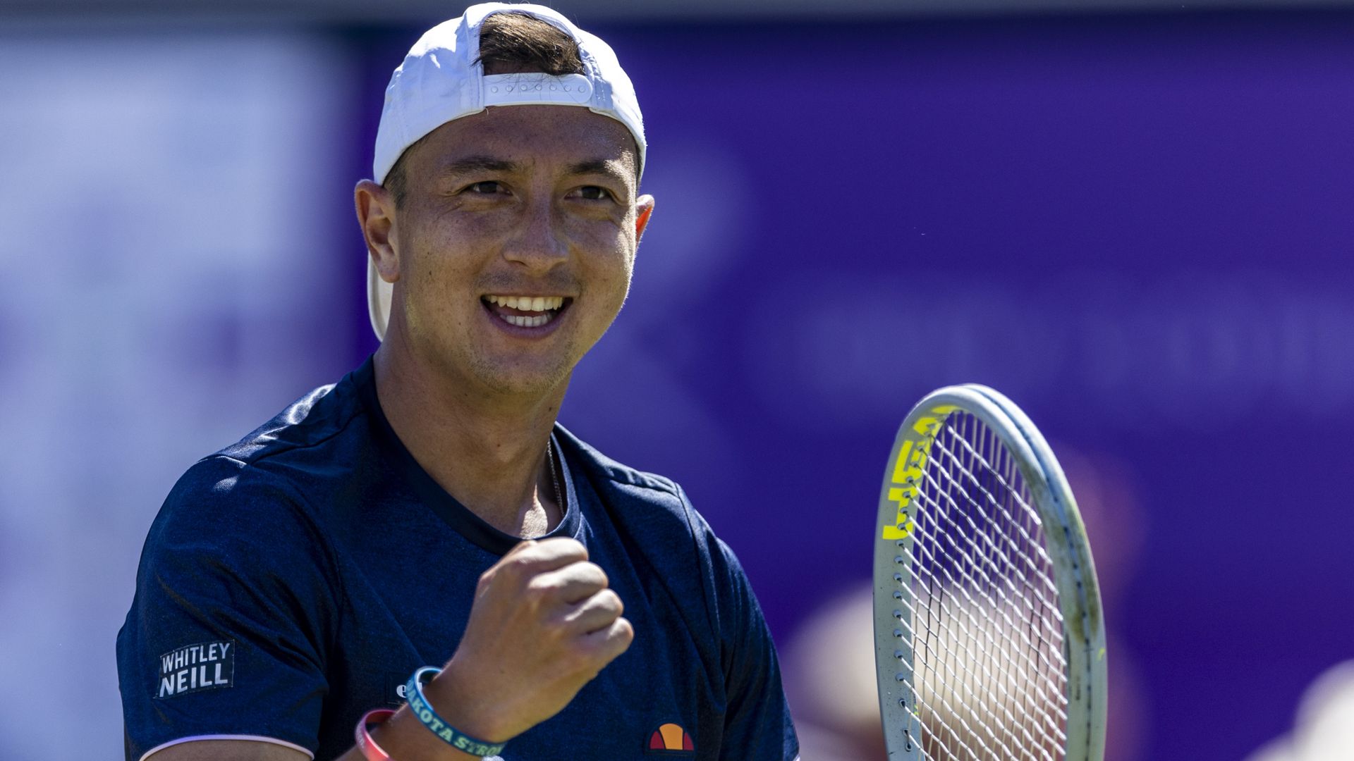 Britain's Peniston enjoys dream Queen's Club debut I Evans knocked out