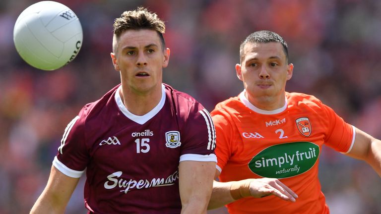Shane Walsh of Galway in action against James Morgan of Armagh