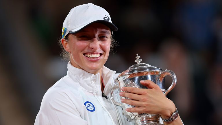 Iga Swiatek of Poland celebrates with the trophy after winning the 2022 French Open at Roland Garros earlier this month